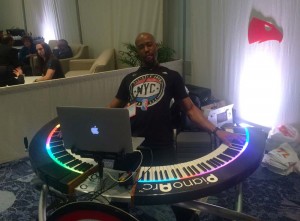 Sir Foster, Atlanta Hawks in stadium artist, driving the PianoArc DualWing at NAMM 2016